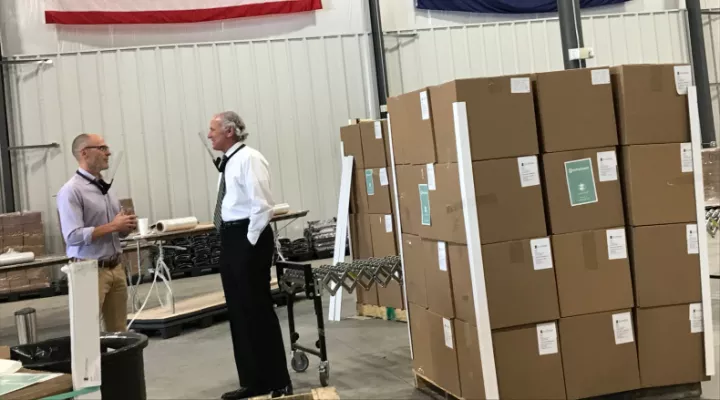 Gov. Henry McMaster talks with ZVerse owner John Carrington in his West Columbia warehouse 