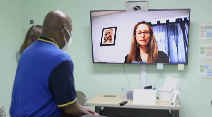 Cristin Swords Adams, DO, MPH, and Assistant Professor for the MUSC Department of Family Medicine, demonstrates how a telehealth visit works at The Navigation Center. 