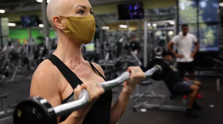  Associated Press political reporter Meg Kinnard lifts weights at her Lexington County gym to strengthen her body as she fights invasive breast cancer.