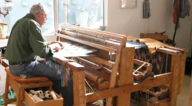 Jim Bassler weaving on the loom: asset-mezzanine-16x9