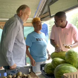 Jeff and JA picking out watermelon