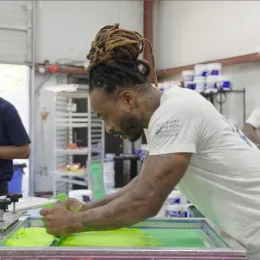 Program student working at the Turn90 shop   