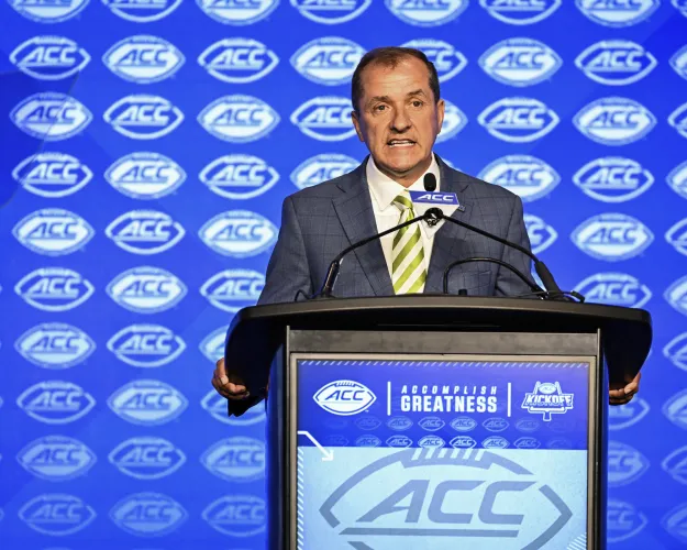 Atlantic Coast Conference commissioner Jim Phillips speaks during an NCAA college football news conference at the ACC media days, Monday, July 22, 2024, in Charlotte, N.C. (AP Photo/Matt Kelley)