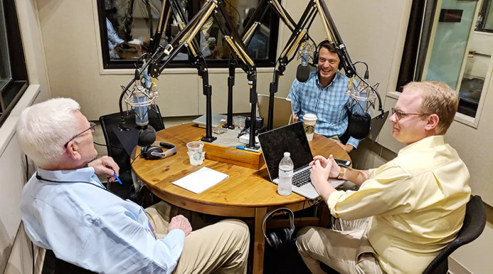 Gavin Jackson (c) speaks with Russ McKinney (l) and Jamie Lovegrove in the SC Public Radio studios on Monday, May 7, 2018.