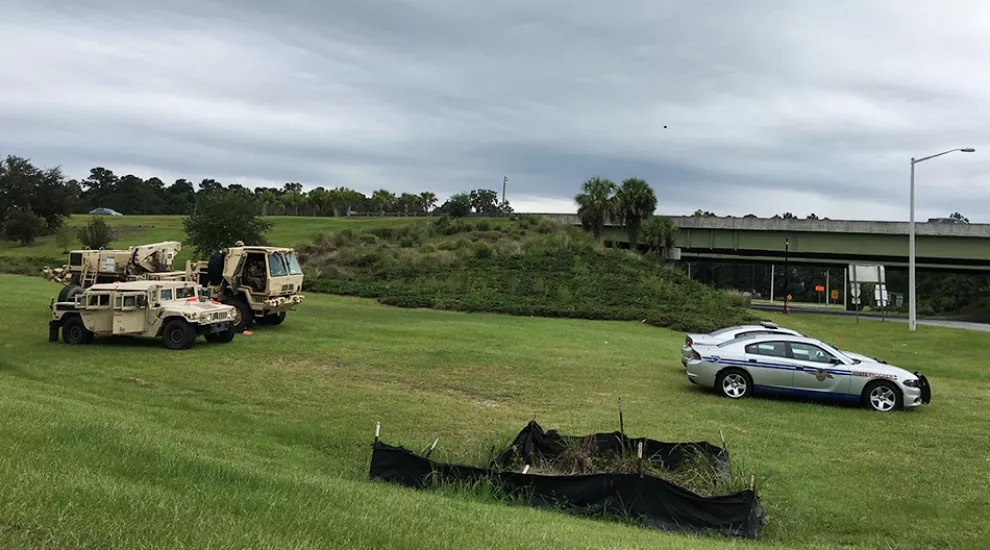 Troopers and National Guard troops.