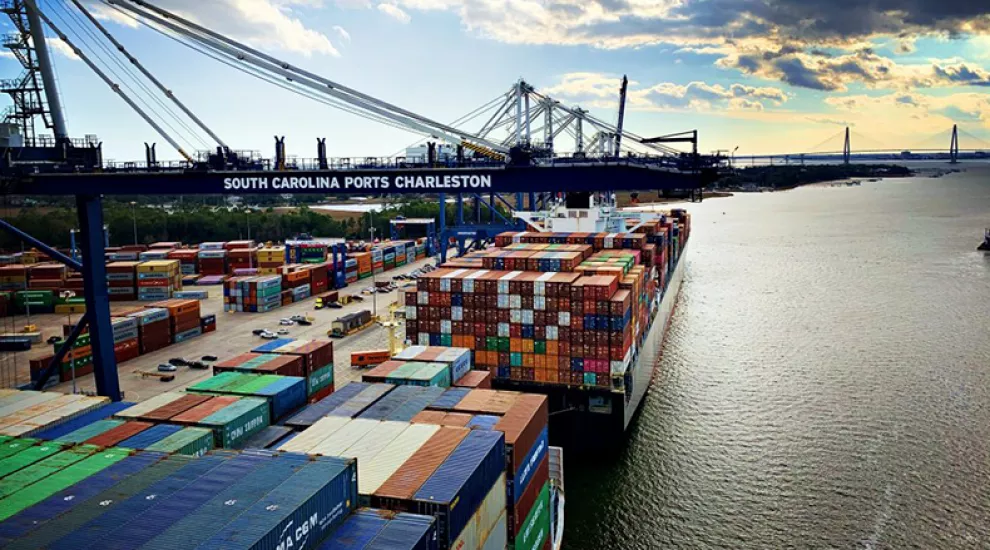 Container ships wait at the Wando Welch Terminal in Charleston, SC.