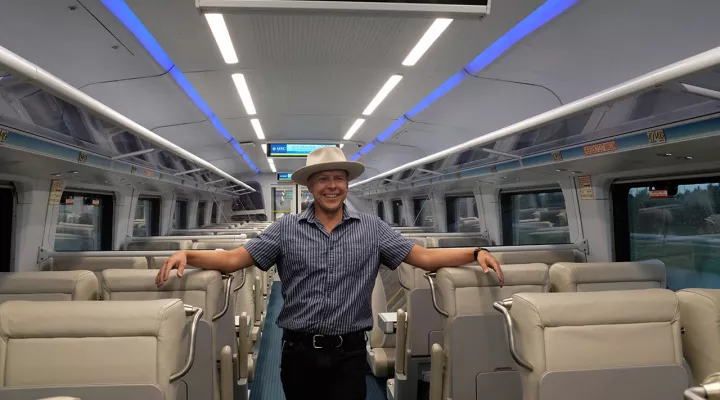 Gabe inside a modern train