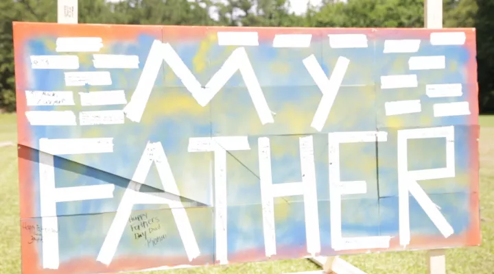 "My Father" sign at a Father's Day event. 