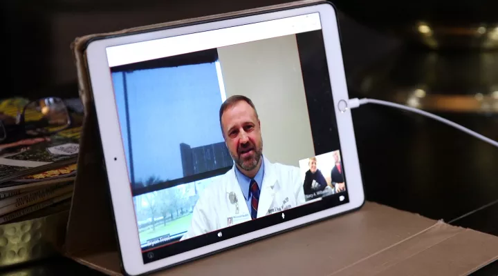 McLeod doctor sees patient over telehealth app.
