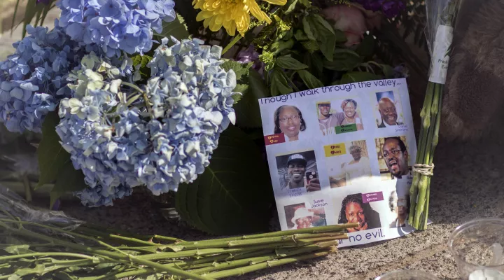 FILE - Flowers line the sidewalk in front of the Emanuel AME Church in Charleston, SC., June, 2015.