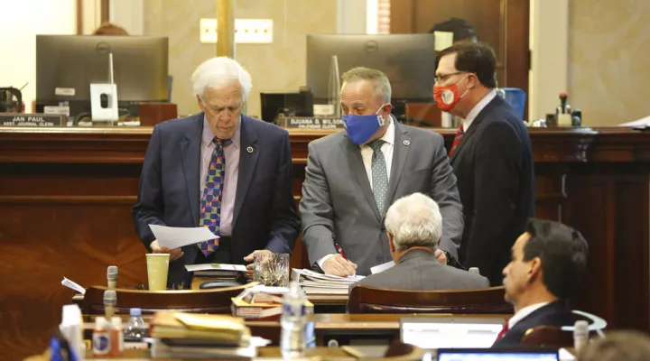 South Carolina Rep. Bill Taylor, left, R-Aiken, and Rep. Russell Fry, right, R-Surfside Beach, discuss their strategy for a bill that would call for a convention to propose amendments to the U.S. Constitution on Tuesday, May 11, 2021, in Columbia, S.C. Supporters said South Carolina would be the 16th of the 34 states needed to call the convention. (AP Photo/Jeffrey Collins)