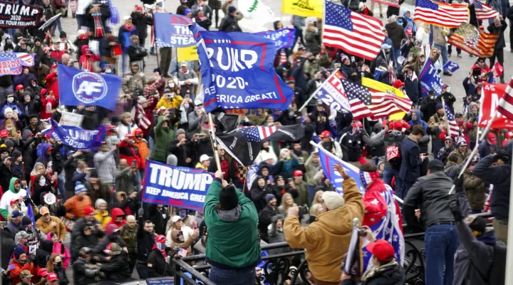 FILE - In this Jan 6, 2021, file photo, violent protesters gather outside the U.S. Capitol in Washington. A South Carolina man accused of throwing objects at police officers, among other crimes, during the deadly insurrection at the U.S. Capitol has been indicted on multiple federal offenses. (AP Photo/Andrew Harnik, File)