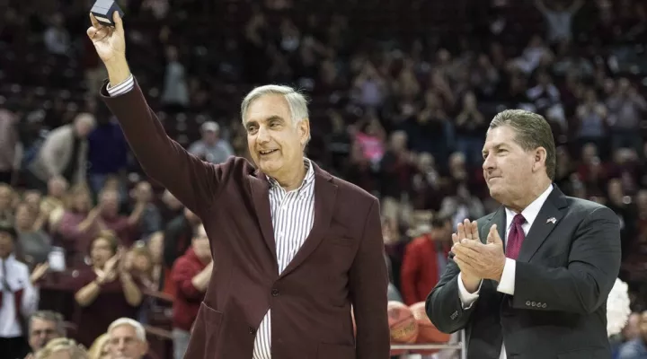 FILE - In this Nov. 10, 2017 file photo, University of South Carolina president Harris Pastides, left, and athletic director Ray Tanner show off a 2017 women's basketball SEC championship ring before an NCAA college basketball game in Columbia, S.C. Pastides was named interim president of the University of South Carolina on Friday, May 21, 2021, after President Bob Caslen resigned on May 13 following a plagiarism scandal. (AP Photo/Sean Rayford, File)