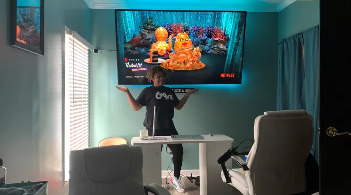  Shana Soberanis wanted The Man Cave's 'Jade Room' to be relaxing, yet manly. So she hung an 86-inch TV in a movie theater-like setting for guys to kick back while they get a pedicure.