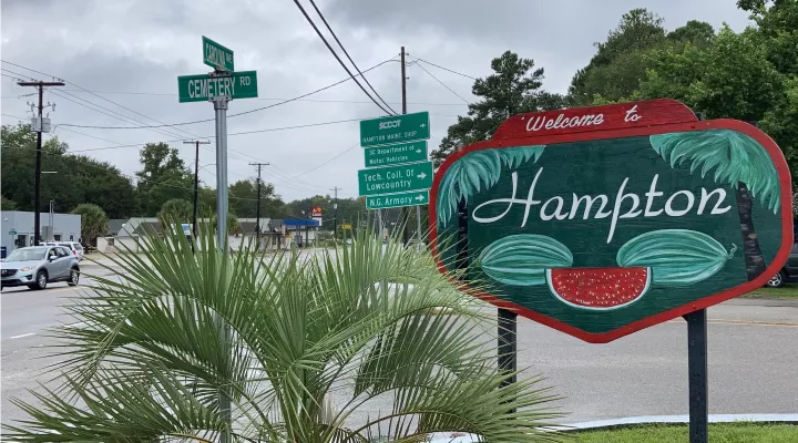 A sign welcomes people to the town of Hampton, S.C., on Monday, Sept. 20, 2021. Attorney Alex Murdaugh and his family have steered much of the legal world in this town of 2,600 for a century. (AP Photo/Jeffrey Collins)