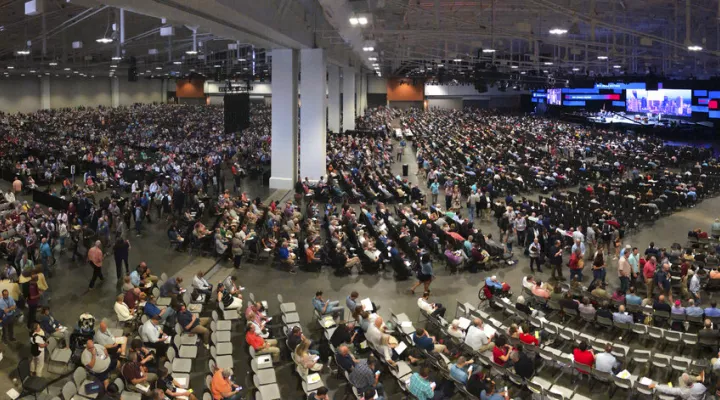 FILE - In this Wednesday, June 16, 2021, file photo, people attend the morning session of the Southern Baptist Convention annual meeting in Nashville, Tenn. At the national SBC gathering in June, thousands of delegates sent the message that they did not want the Executive Committee to oversee an investigation of its own actions on how it handled sexual abuse allegations. (AP Photo/Mark Humphrey, File)