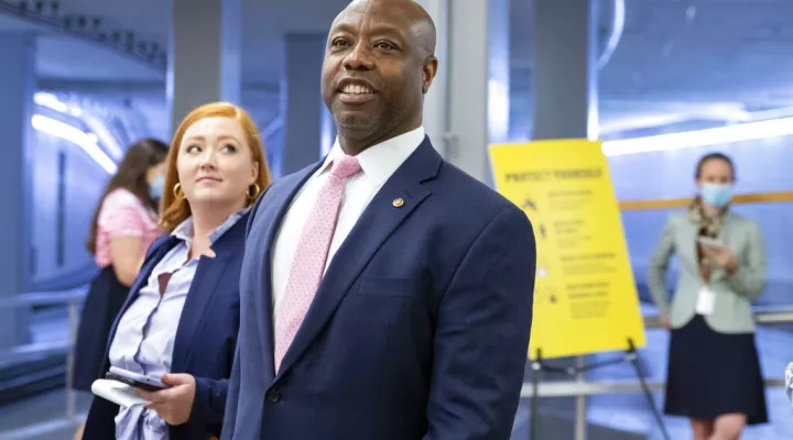 FILE - Sen. Tim Scott, R-S.C., speaks to reporters amid ongoing negotiations on the infrastructure bill on Capitol Hill in Washington, on Wednesday, Aug. 4, 2021. Scott didn't endorse a primary candidate in South Carolina's 2018 gubernatorial race, but for 2022, he's offering an early nod to incumbent Gov. Henry McMaster.  Next month, Scott is the special guest at a fundraiser for McMaster's reelection campaign, according to an invitation obtained by The Associated Press.  (AP Photo/Amanda Andrade-Rhoades,…