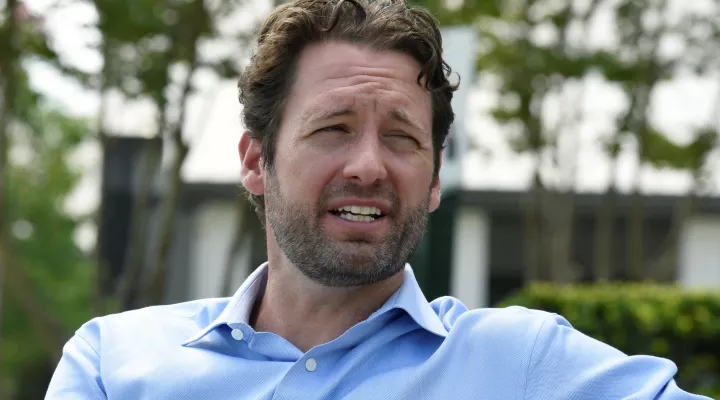 FILE - Former U.S. Rep. Joe Cunningham talks during an interview with The Associated Press about his campaign for South Carolina governor on Saturday, July 10, 2021, in Mount Pleasant, S.C. As pandemic-related supply shortages drive gas prices across the country to record highs, aThe Democrat seeking to become South Carolina's next governor suggests a suspension of the state's gas tax as a way to alleviate cost burdens at the pump. (AP Photo/Meg Kinnard)