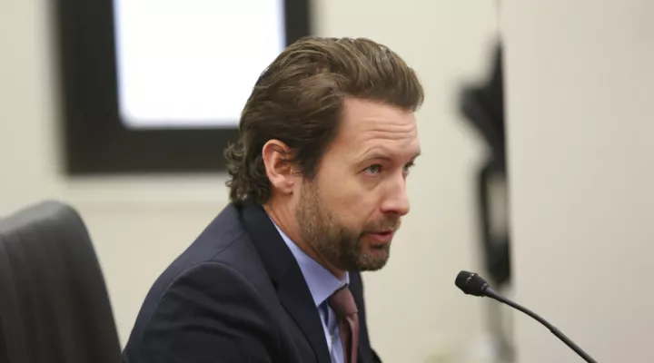 Former Democratic U.S. Rep. Joe Cunningham testifies before a South Carolina Senate subcommittee considering new maps for U.S. House districts on Monday, Nov. 29, 2021, in Columbia, S.C. Cunningham asked senators to reject the new maps, saying they appeared to be drawn by a partisan hack to help Republicans.(AP Photo/Jeffrey Collins)