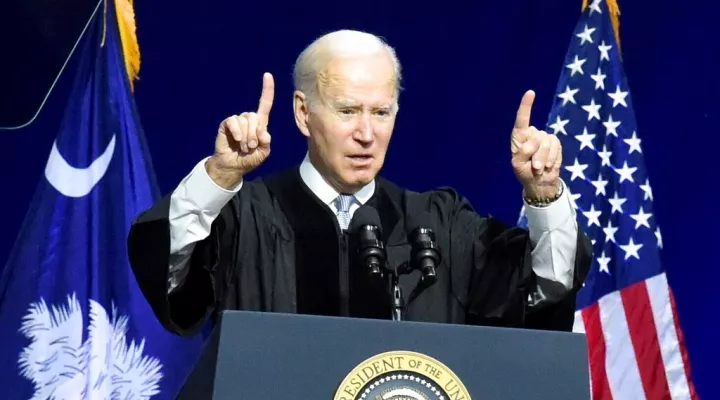 President Joe Biden speaks at commencement exercises for South Carolina State University on Friday, Dec. 17, 2021, in Orangeburg, S.C. (AP Photo/Meg Kinnard)