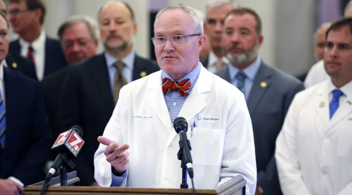 Dr. Robert Brown, an ear, nose and throat specialist in Greenville, South Carolina, talks about wanting South Carolina to appeal a law that requires hospitals and other medical businesses to get permission from the state to expand or buy expensive equipment on Wednesday, Jan. 12, 2022, in Columbia, South Carolina. The state Senate made debate on the bill a priority. (AP Photo/Jeffrey Collins)