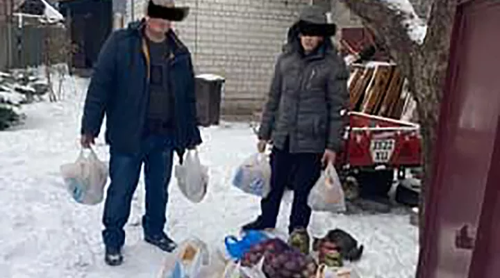 Summer of God Slavic Evangelical Church's Ukraine Relief Project is putting food, water, and medical supplies into the hands of citizens caught in the midst of a war. Though their faces are obscured in this photo, church members in the Upstate know them personally.