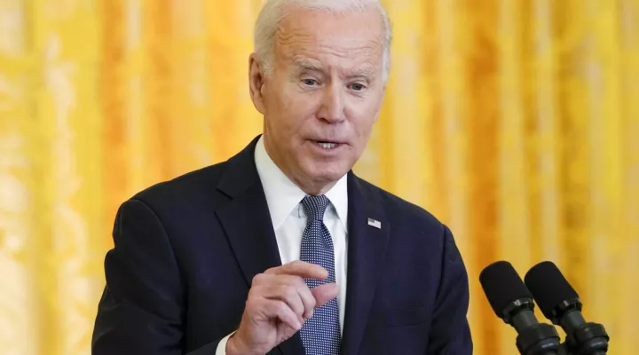 President Joe Biden speaks during a news conference with French President Emmanuel Macron in the East Room of the White House in Washington, Thursday, Dec. 1, 2022. (AP Photo/Susan Walsh)