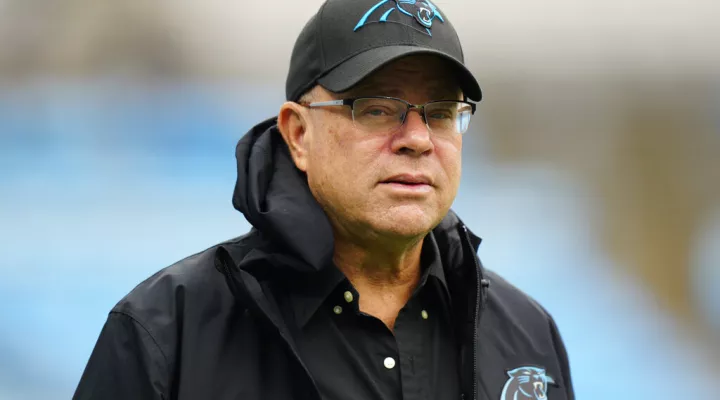 FILE - Carolina Panthers owner David Tepper watches during warm ups before an NFL football game between the Carolina Panthers and the Denver Broncos on Sunday, Nov. 27, 2022, in Charlotte, N.C. A sheriff in South Carolina has announced his deputies started a criminal investigation into whether Tepper or his company misused public money meant for a failed practice facility. (AP Photo/Jacob Kupferman, File)