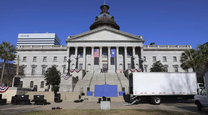 Workers prepare the Statehouse the day before Gov. Henry McMaster's inauguration on Tuesday, Jan. 10, 2023, in Columbia, S.C.(AP Photo/Jeffrey Collins)