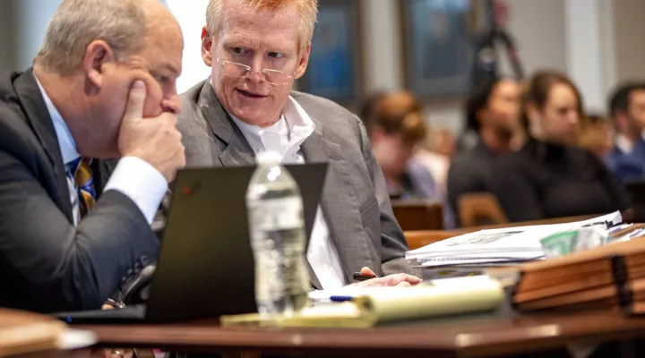 Defense attorney Jim Griffin talks with his client Alex Murdaugh during Murdaugh's double murder trial at the Colleton County Courthouse in Walterboro, S.C., Wednesday, Feb. 1, 2023. (Andrew J. Whitaker/The Post And Courier via AP, Pool)