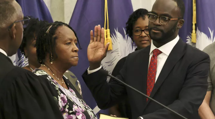 Brian Gaines is sworn in as the South Carolina Comptroller General on Friday, May 12, 2023, in Columbia, S.C. The governor named a new top accountant after the previous 20-year officeholder resigned amid mounting scrutiny over a $3.5 billion reporting error. (AP Photo/James Pollard)